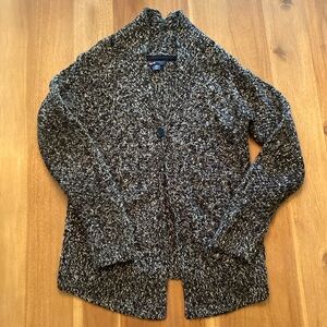 Black and white cable knit one button sweater. Excellent condition.